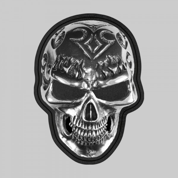 Tête de mort tribale ajourée – motif à riveter en étain, rondelle de cuir noire