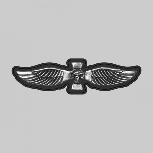 Barrette tête de mort ailée – sur rondelle de cuir noire